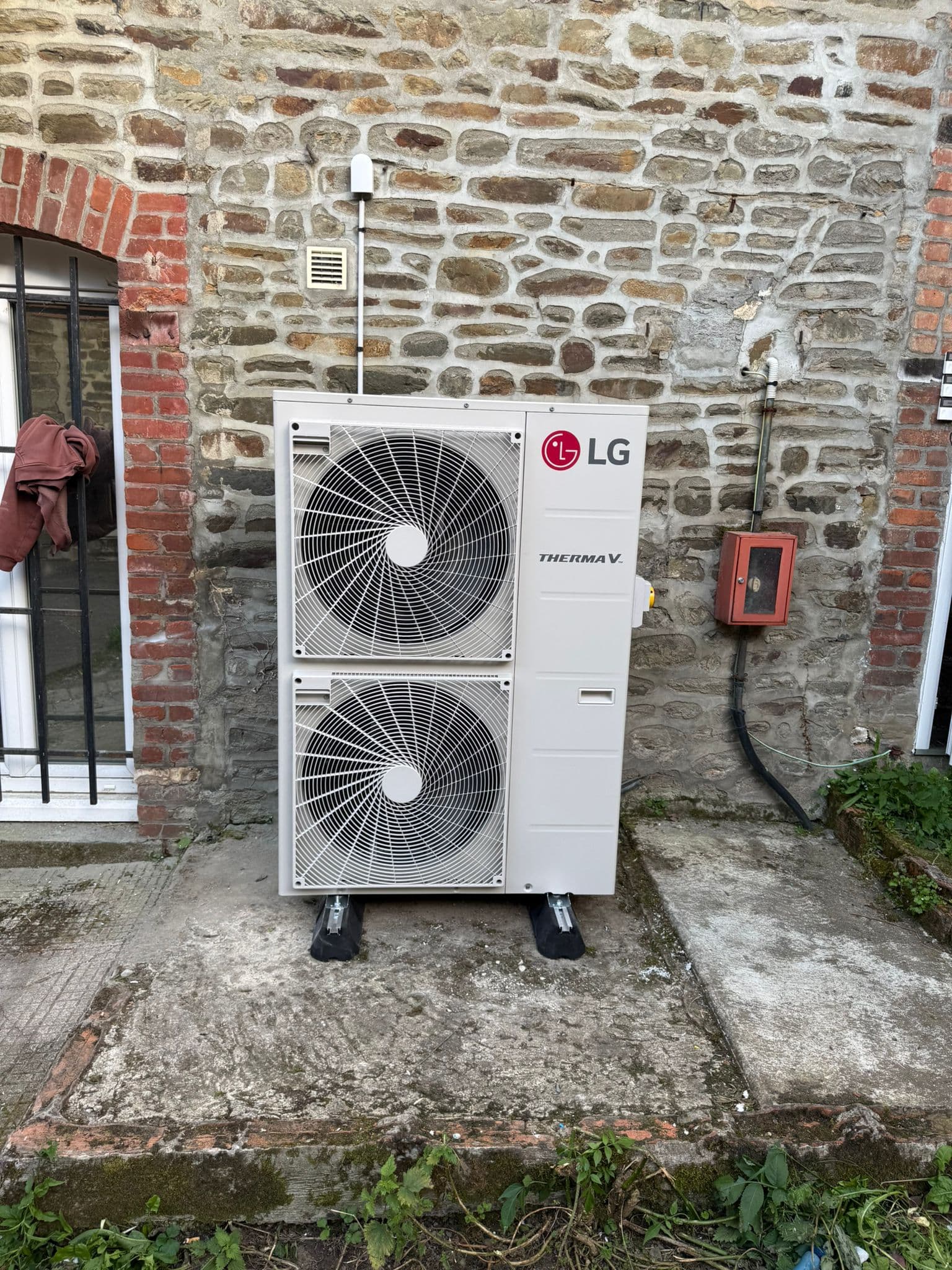 PAC air/eau & ballon préparateur ECS — Immeuble résidentiel collectif