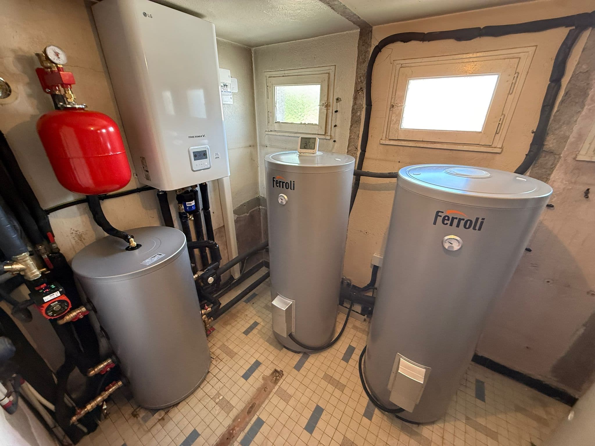 PAC collective & ballon préparateur ECS — Immeuble d'habitation